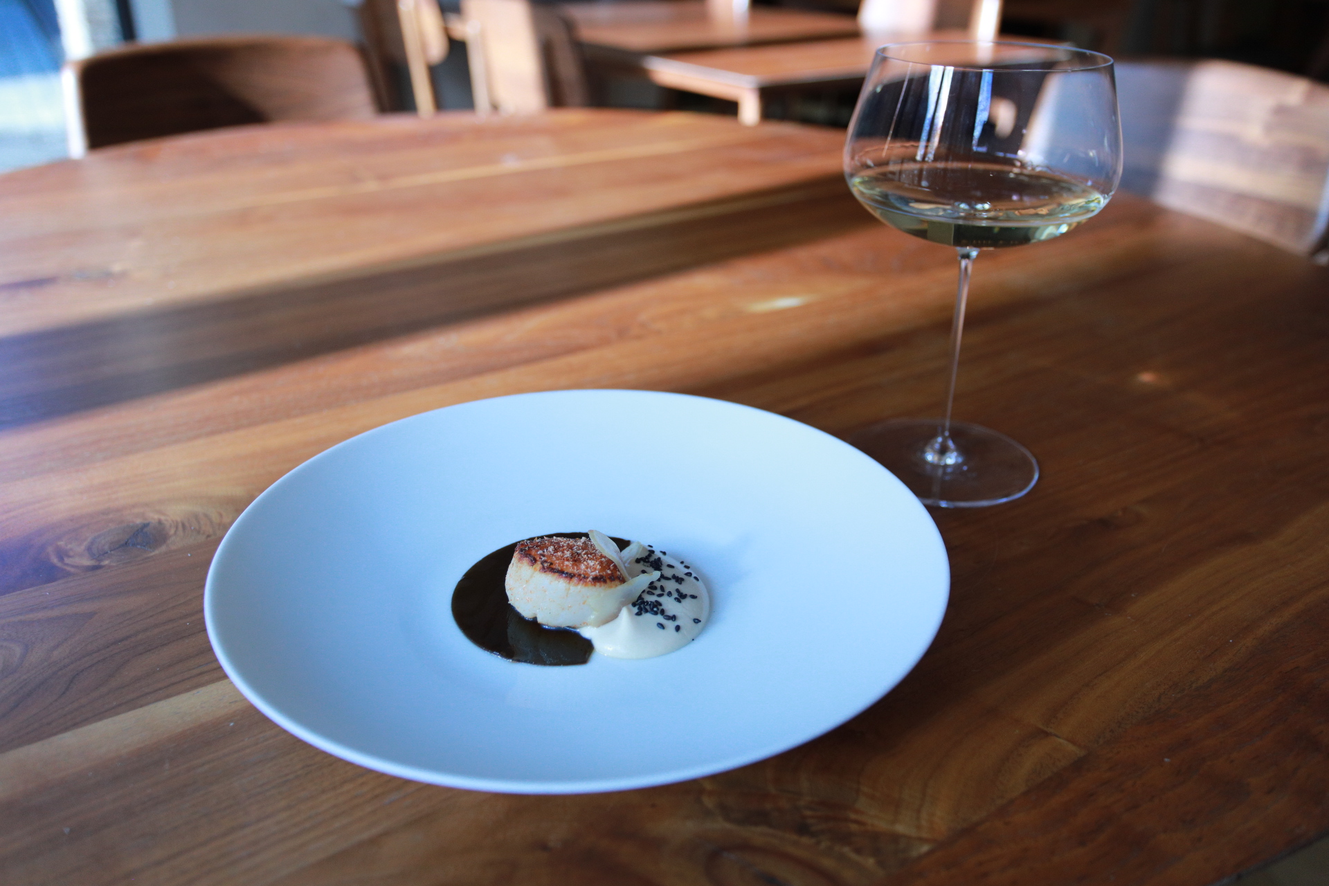 Seared Scallop Confit Kombu sesame and Pickled Hand of Buddha by Trivet Restaurant, London.