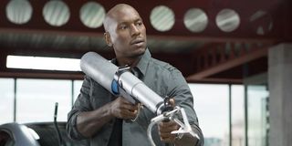 Tyrese Gibson as Roman Pearce with a harpoon gun