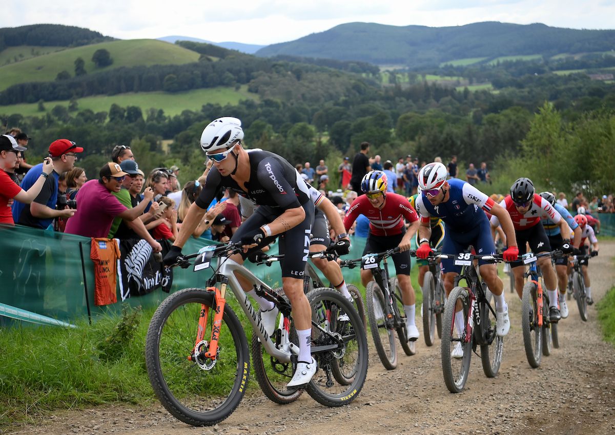 Picture by Thomas Maheux/SWpix.com - 10/08/2023 - 2023 UCI Cycling World Championships - MTB Cross Country - Glentress Forest, Peebles, Scotland - Elite Men Cross-country Short Track - Sam Gaze - New Zealand leads up th ehill