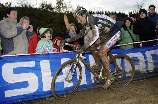 Niels Albert (BKCP-Powerplus) dries to find some firmer ground along the barriers.