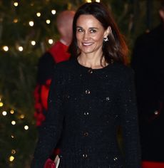 Pippa Middleton wearing a black coat
