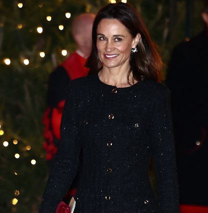 Pippa Middleton wearing a black coat