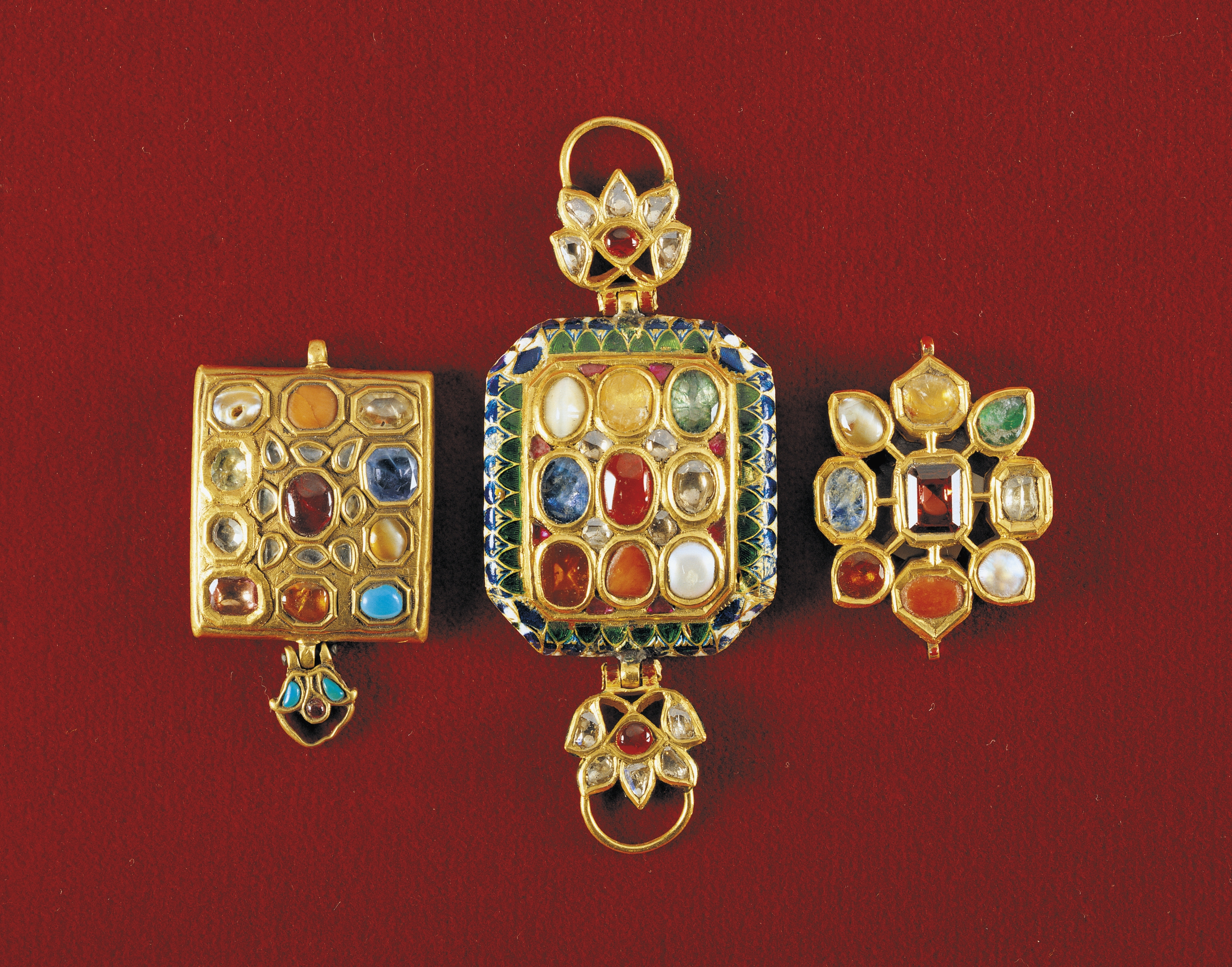 Navaratna pendants with nine stones set in gold