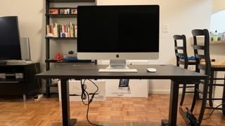 The UpLift V2 Desk with an iMac on it at my home