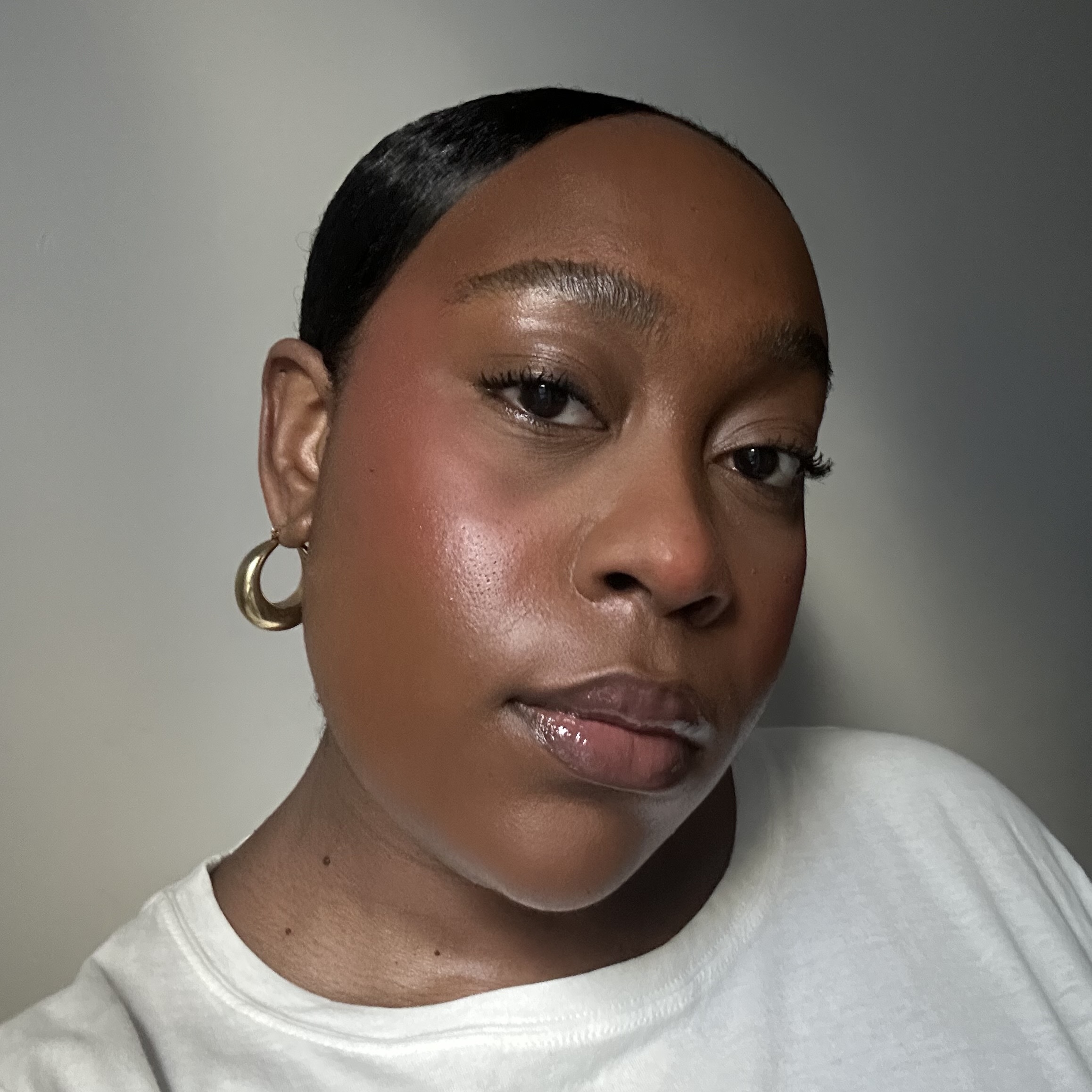 Who What Wear's Branded Content Editor, Aniyah Morinia, wearing Bake Up Tarantulash Mascara