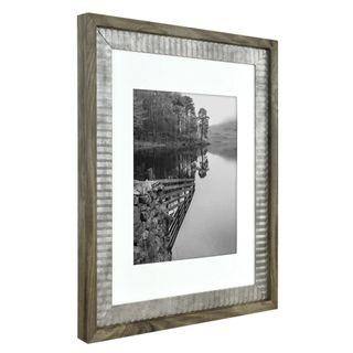 A wooden and silver picture frame from Walmart