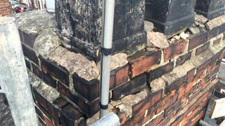 Close up of poorly pointed chimney