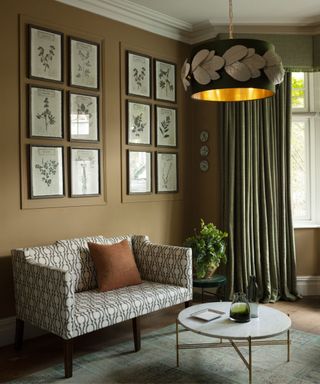 Brown living room, green curtains and lampshade