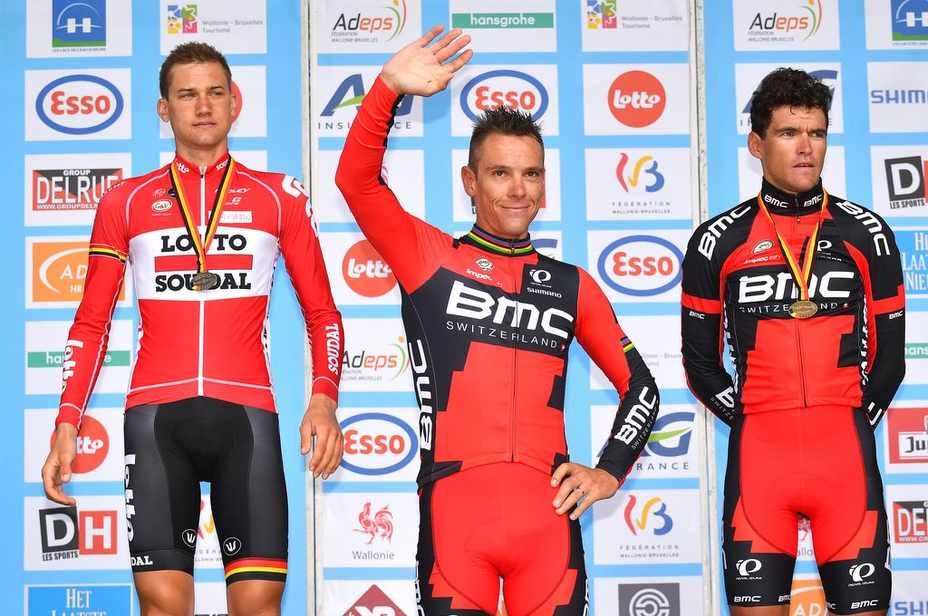 Philippe Gilbert waves from the podium