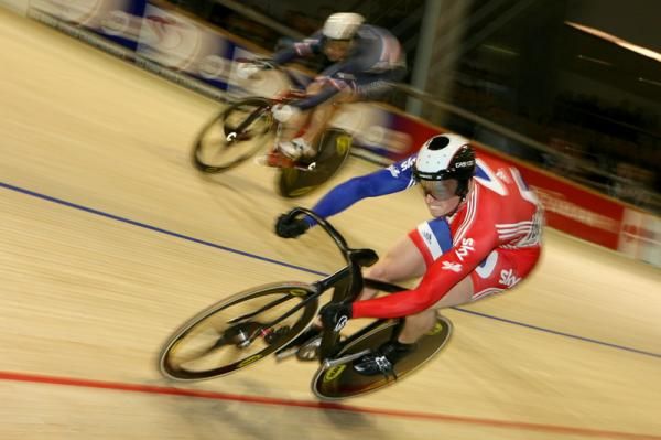 Matt Crampton (Great Britain) attacks Francois Pervis (France) in the 1/8 final of the men's sprint