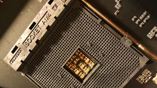 A close-up photo of AMD's AM4 CPU socket