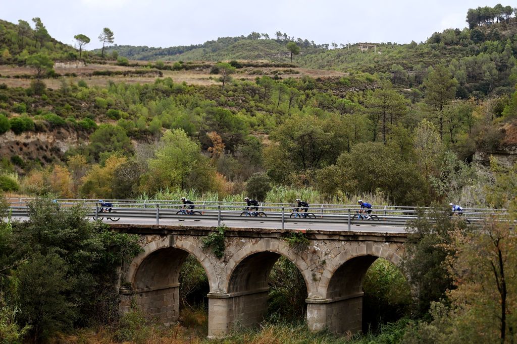 BARCELONA SPAIN AUGUST 27 A general view of the peloton passing through a landscape during the 78th Tour of Spain 2023 Stage 2 a 1818km stage from Matar to Barcelona UCIWT on August 27 2023 in Barcelona Spain Photo by Tim de WaeleGetty Images
