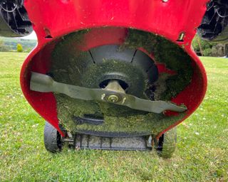 Image showing the underneath of a Mountfield HP185 139cc lawn mower