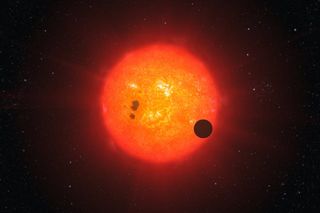 Artist's impression of an exoplanet transiting a red dwarf star.
