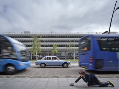 A Time ⋅ A Place: An exploration of automotive and architectural design: image of Preston Bus Station and blue car