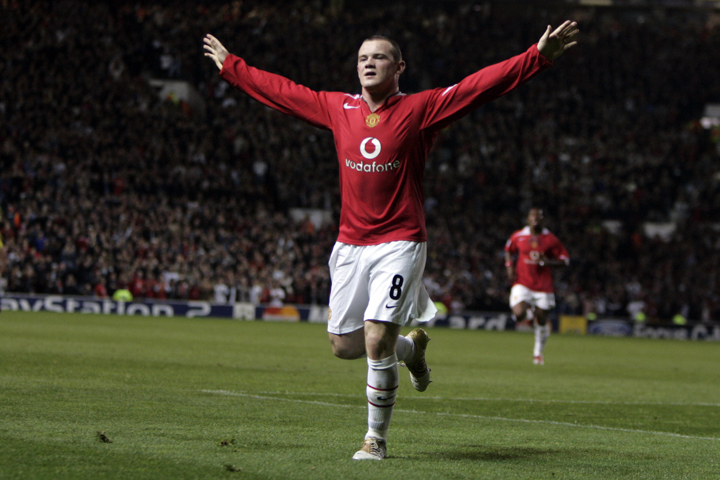 Wayne Rooney celebrates after completing a hat-trick on his Manchester United debut against Fenerbahce in the 2004/05 Champions League group stage