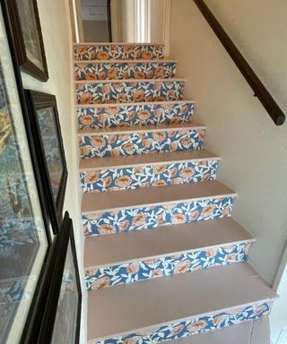Painted staircase using floral design in pink and blue