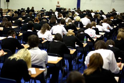 Students sit an exam 