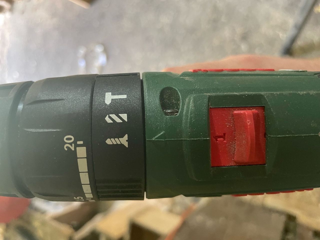 A Bosch 18v drill has two speeds on top, torque settings and a screwdriver, drill and hammer drill setting on top