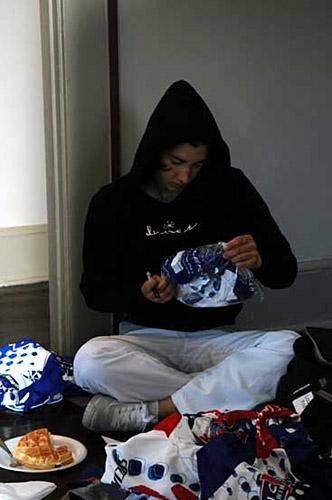 Laura Yoisten is busy labelling her clothing