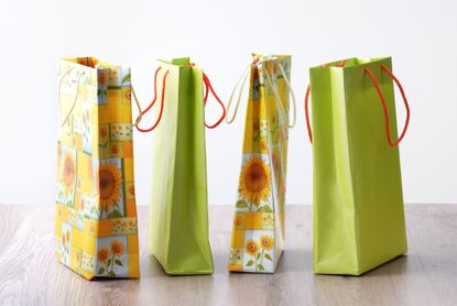 four shopping bags green and floral pattern