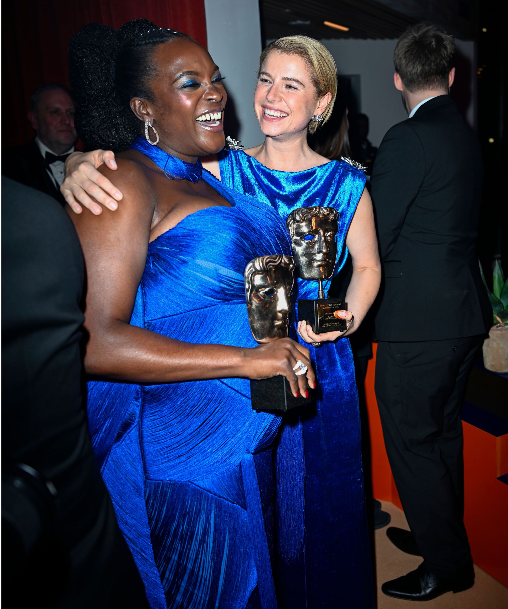 wunmi mosaku and jessie buckley in cobalt dresses at the BAFTA after parties