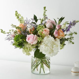 FTD Fresh Picked Porcelain bouquet on a white table