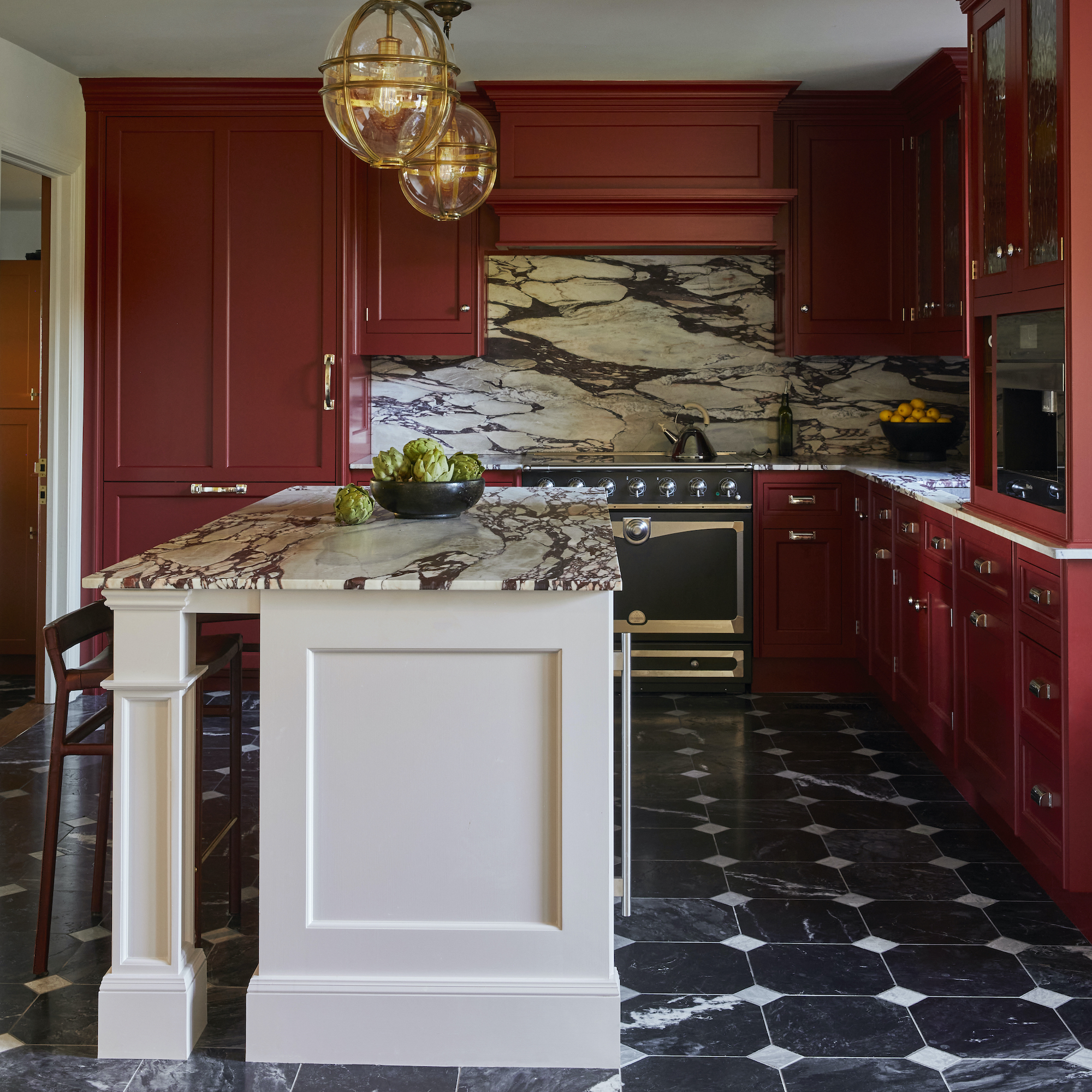 kitchen with red and white cabinets