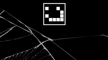 A pixel smiley face sits against a shattered black screen background