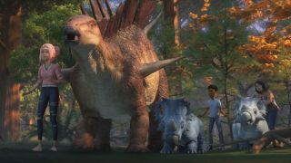 Scene from the animated TV show Jurassic World: Camp Cretaceous. Darius, Brooklyn, and Sammy with a Kentrosaurus and two baby genetically engineered horned dinosaurs.