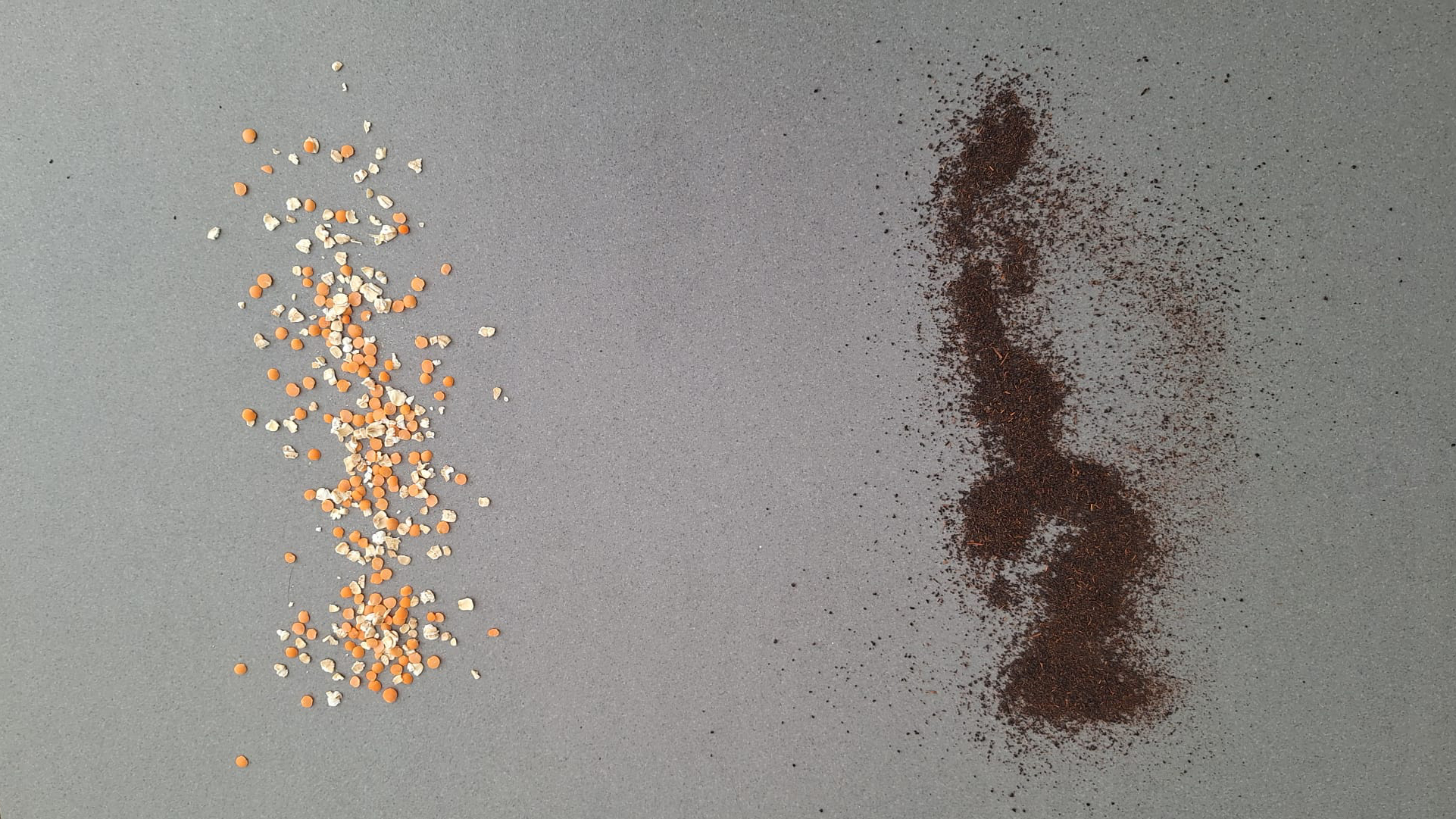 Oats and lentils, and tea, on a tiled floor ready for the suction tests