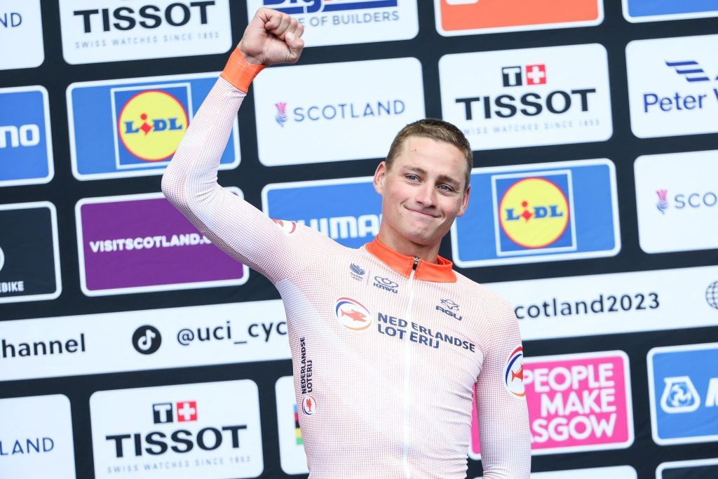 Dutch Mathieu van der Poel celebrates on the podium after winning the men elite road race