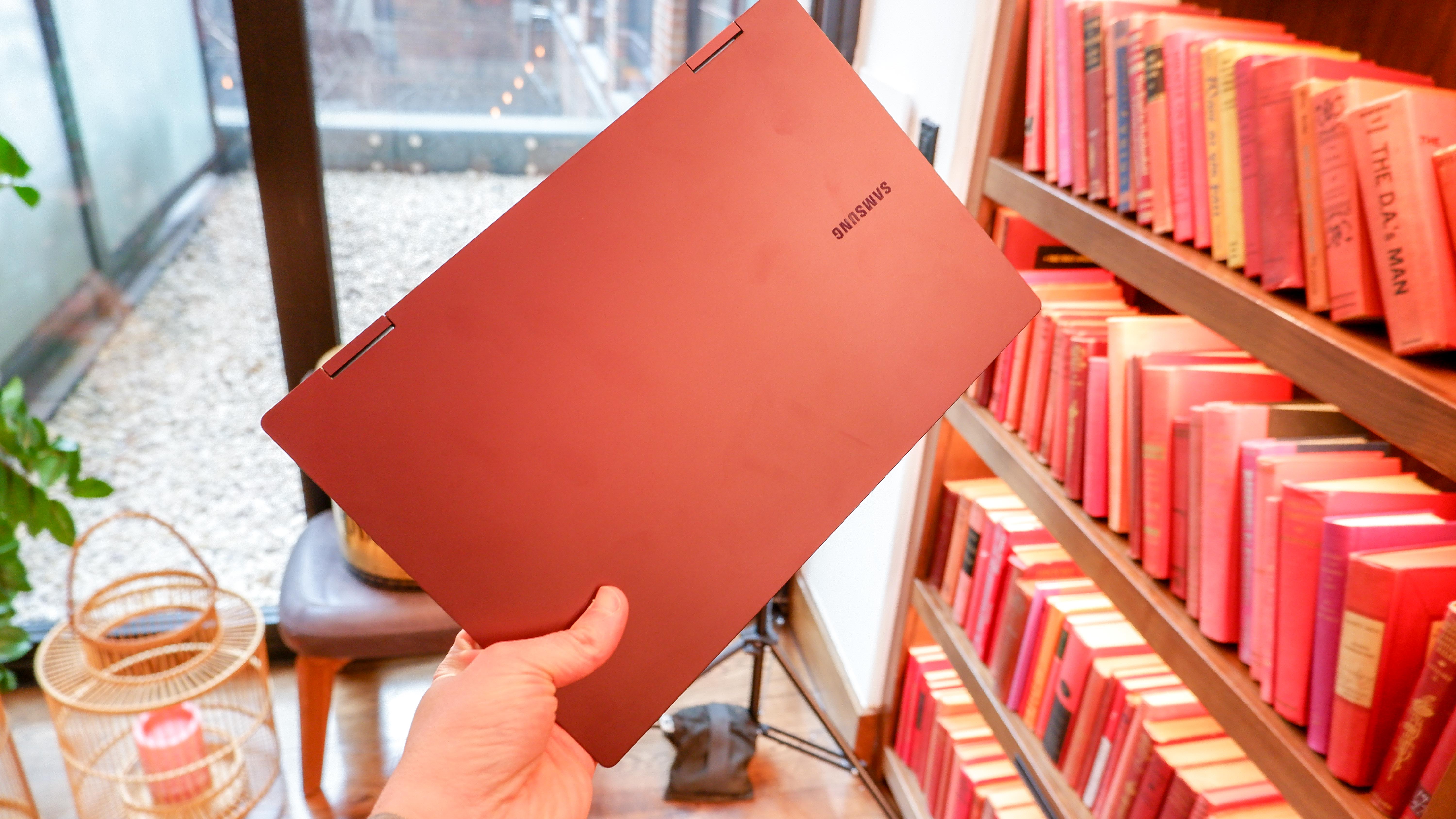 Samsung Galaxy Book2 Pro 360 held in hand