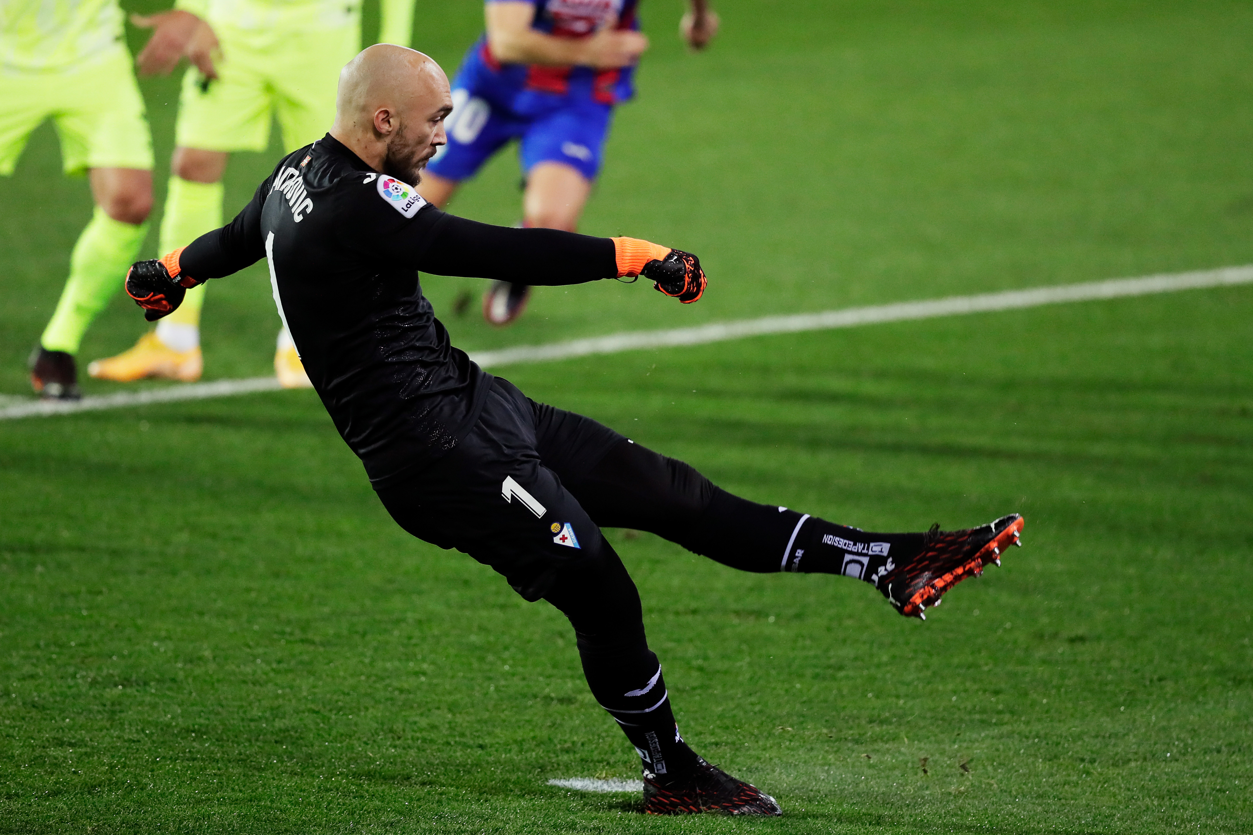 Eibar goalkeeper Marko Dmitrovic scores a penalty against Atletico Madrid in La Liga in January 2021.