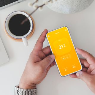 Tado smart thermostat app on a phone