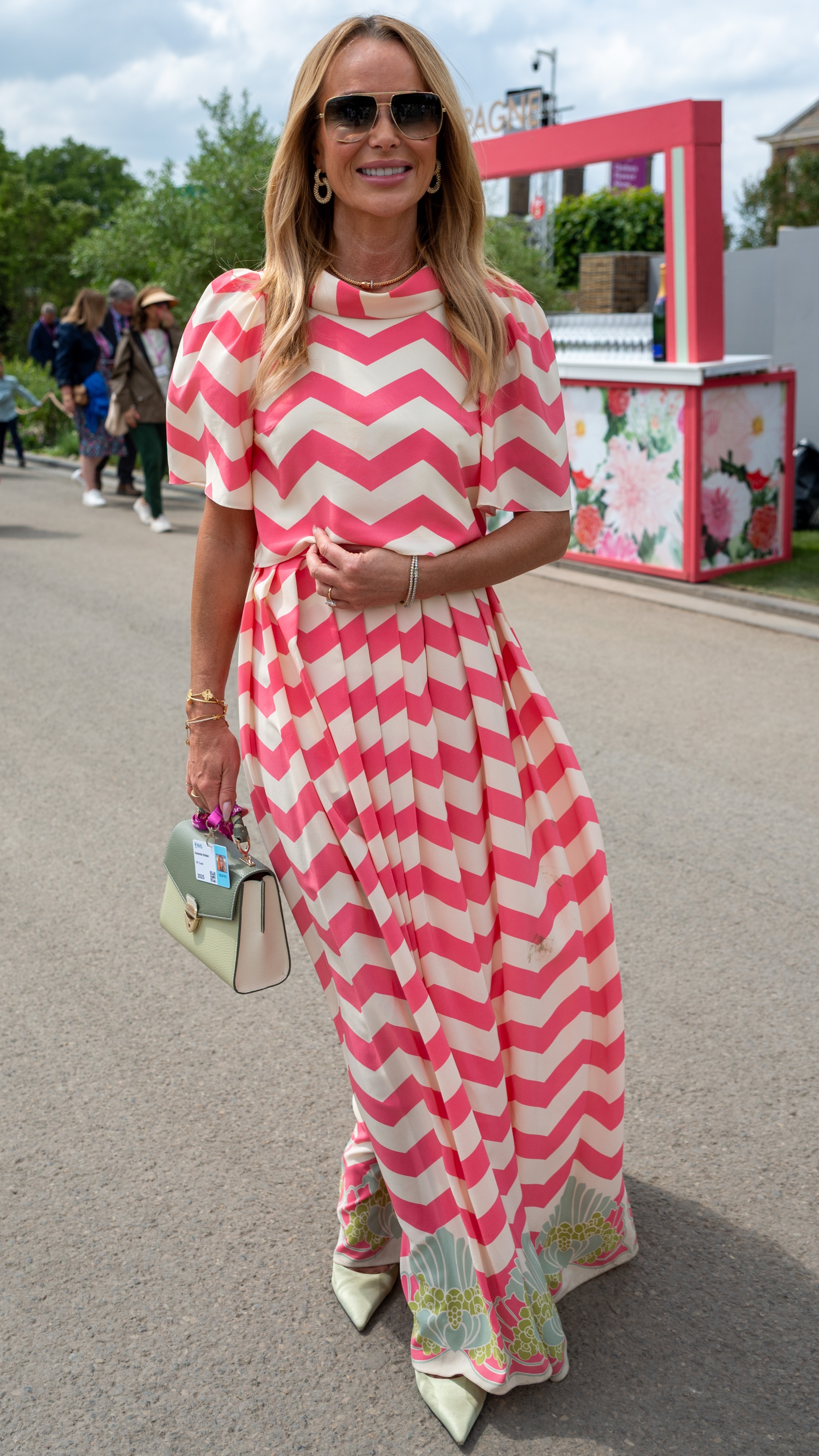 Amanda Holden poses for a photo as she attends the RHS Chelsea Flower Show on May 19, 2025 in London, England