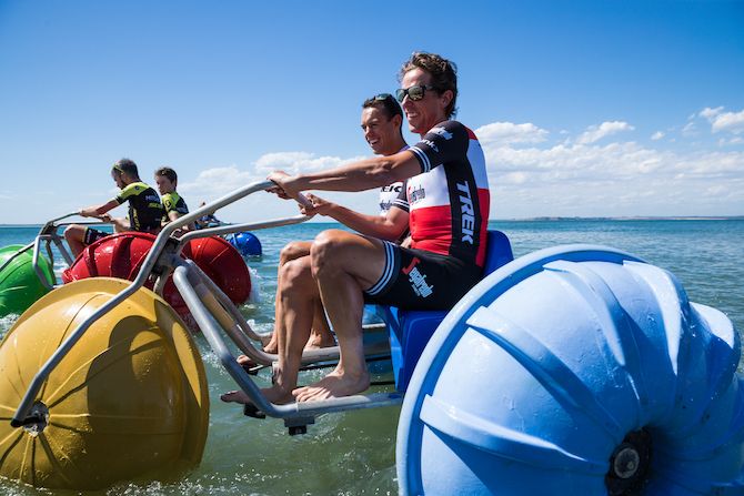 Richie Porte and Koen de Kort (Trek-Segafredo) try out an aqua bike on Phillip Island ahead of the 2019 Herald Sun Tour