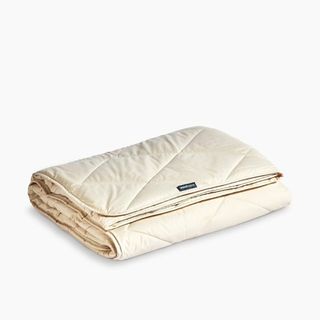 Organic Washable Wool Comforter - Light against a white background.