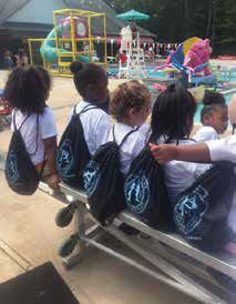 Pre-K students in an APSD summer program received both swimming and academic instruction.  