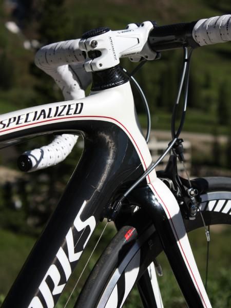 The Amira uses a tapered front end but the lower bearing uses a 1 3/8" diameter instead of the Tarmac's 1 1/2".