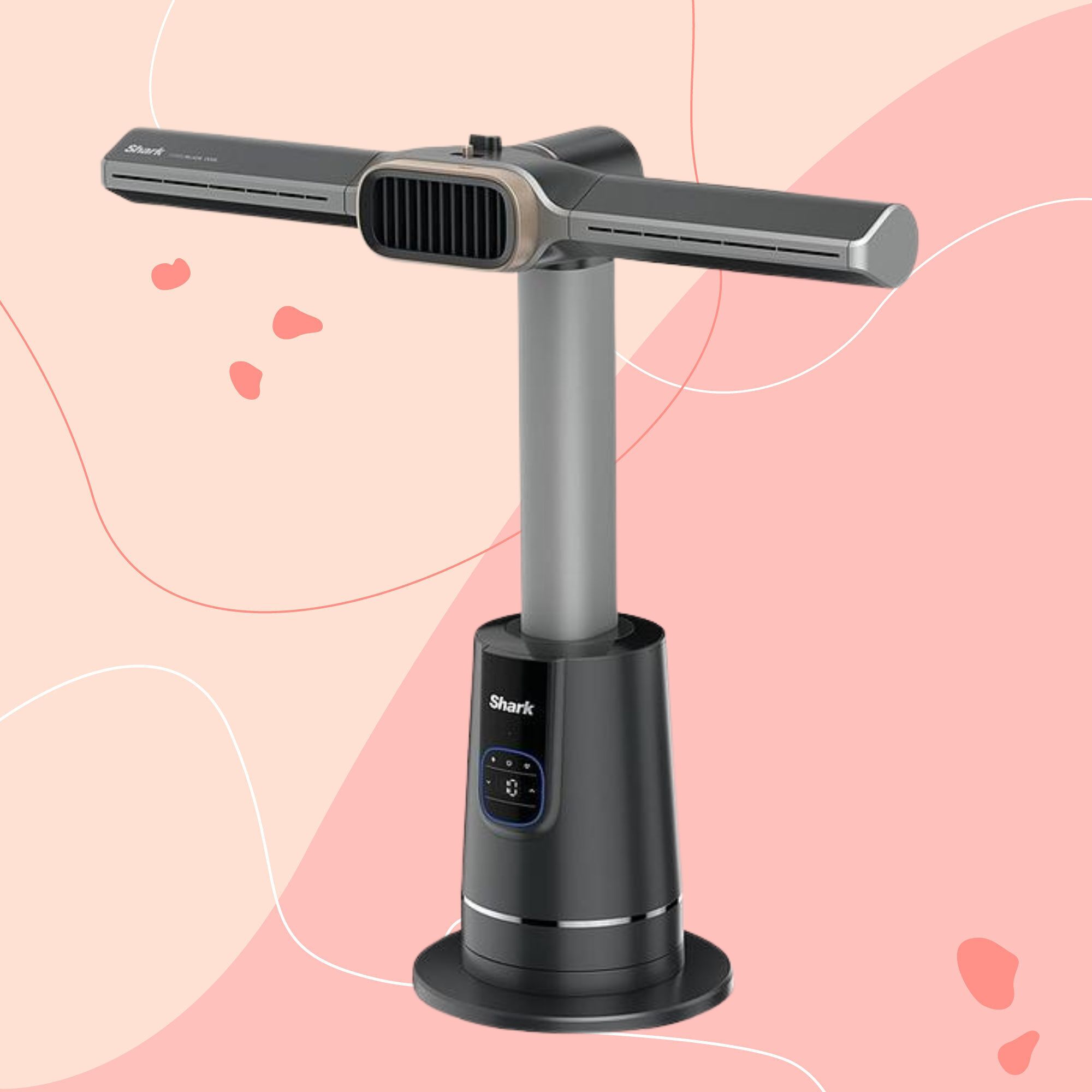 Shark TurboBlade Cool + Heat TH200UK on a pink background