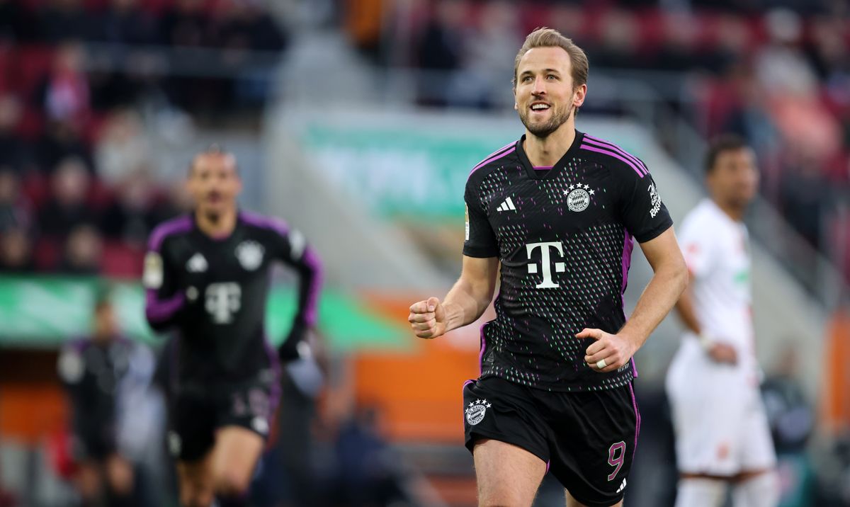 Tottenham legend Harry Kane of Bayern Muenchen celebrates as he scores the goal 1:3 during the Bundesliga match between FC Augsburg and FC Bayern München at WWK-Arena on January 27, 2024 in Augsburg, Germany.