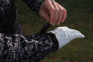 The cuffed sleeve of the Shaw Golf Viking waterproof