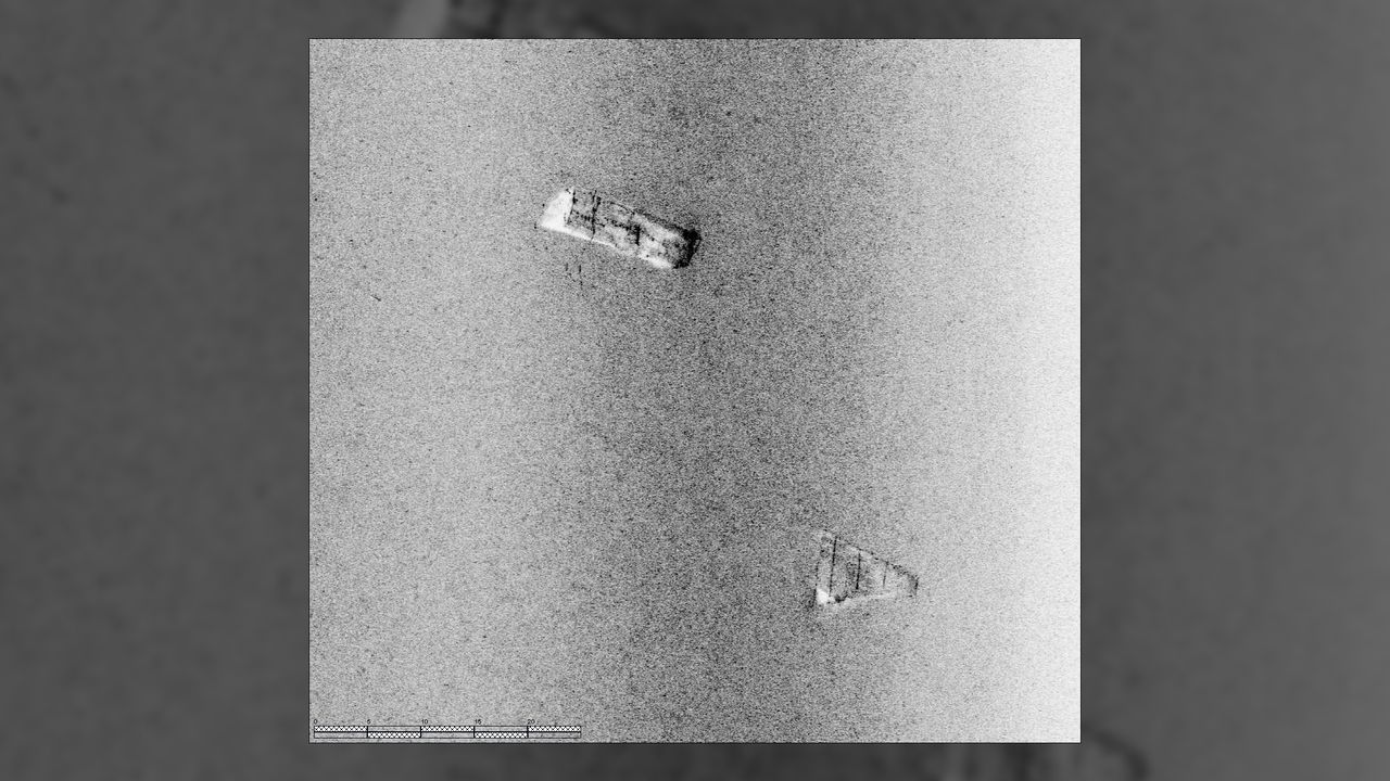 Black and white photo showing that the ship sank in two when it sank.