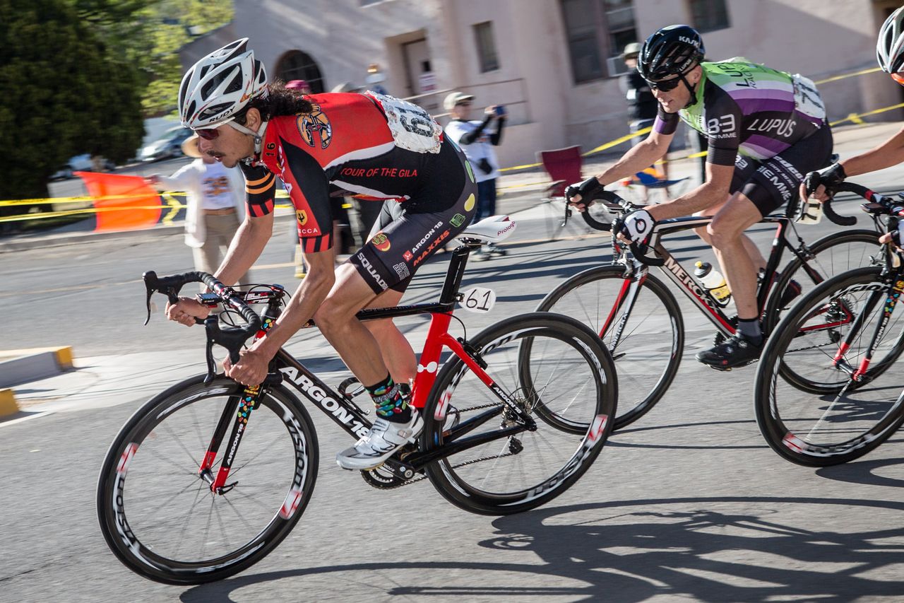 Lachlan Morton (Jelly Belly) riding at the front