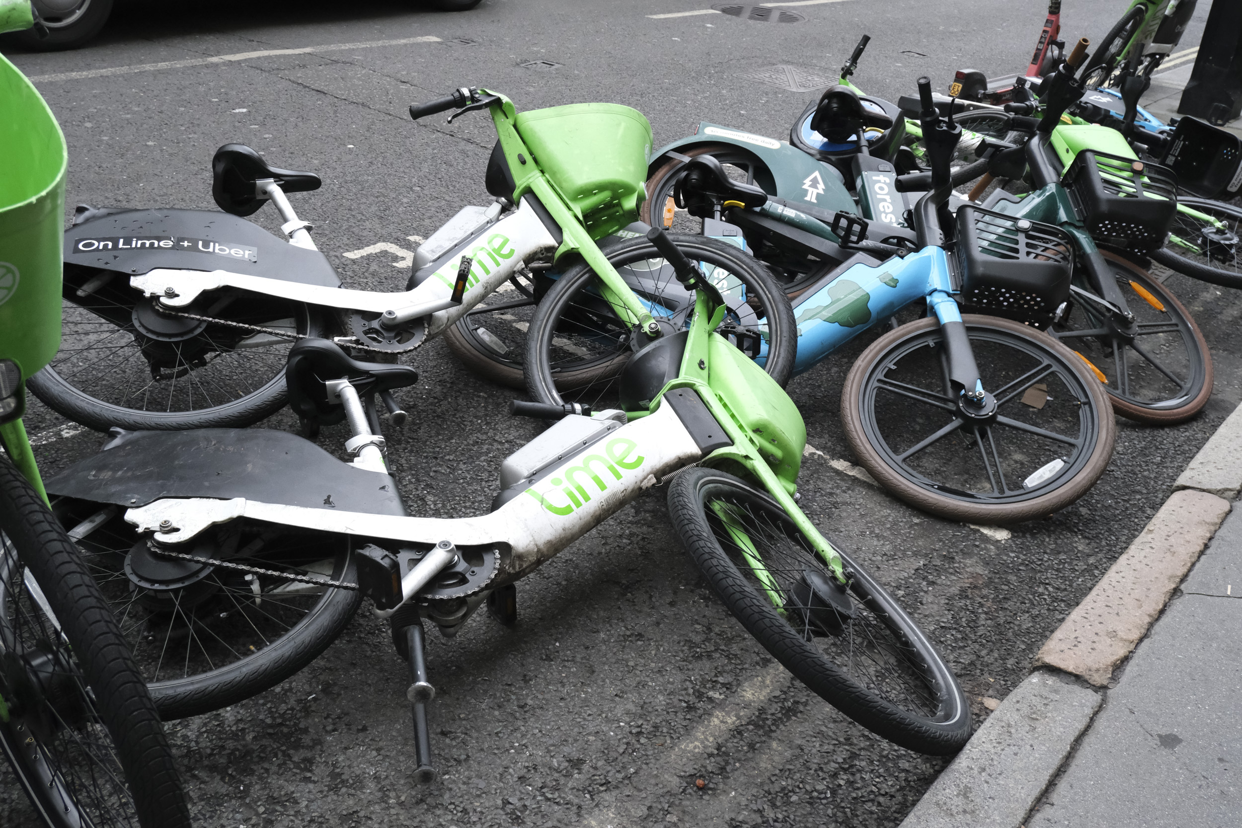 London street photo of fallen hire bikes, taken with the Fujifilm X-M5