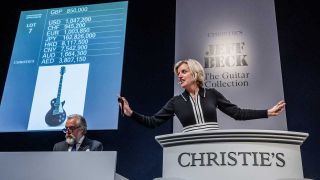 Auctioneer Tash Perrin during the sale of Jeff Beck's 'Blow By Blow' guitar