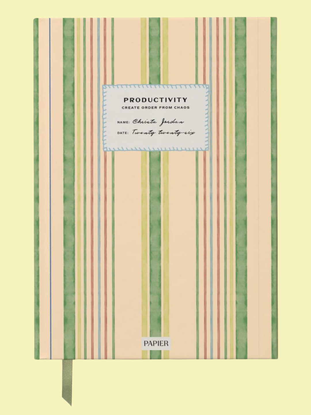 A striped productivity planner by Papier titled 'Dreams &amp;amp; Schemes'