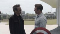Tony Stark giving Chris Evans his shield back in Avengers: Endgame.