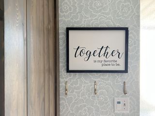 Together sign on entryway wall